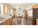 Spacious open-concept kitchen and dining area with hardwood floors and lots of natural light at 722 E Pine Ave, Wake Forest, NC 27587