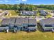 Aerial shot of townhomes displaying neat landscaping and parking at 743 Hadstock Path Path, Zebulon, NC 27597
