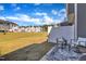 Charming outdoor patio with seating, lush grass and privacy fence at 743 Hadstock Path Path, Zebulon, NC 27597