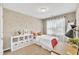 A well-lit bedroom shows a single bed and butterfly themed decorations at 743 Hadstock Path Path, Zebulon, NC 27597