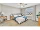 Bedroom showcasing a queen bed, modern decor, and natural light from the window at 743 Hadstock Path Path, Zebulon, NC 27597