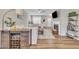 Well-decorated living space with a fireplace, sectional sofa, and bar area, perfect for entertaining at 743 Hadstock Path Path, Zebulon, NC 27597