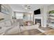 Inviting living room with a fireplace, comfortable sectional sofa, and stylish decor for a welcoming atmosphere at 743 Hadstock Path Path, Zebulon, NC 27597