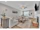 Bright living room featuring a fireplace, sectional sofa, and stylish accents, creating a cozy and inviting space at 743 Hadstock Path Path, Zebulon, NC 27597