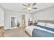 Spacious main bedroom with ample room, ceiling fan, and adjoining entry ways at 743 Hadstock Path Path, Zebulon, NC 27597
