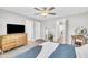 Comfortable main bedroom featuring modern furniture, neutral walls, and carpet flooring at 743 Hadstock Path Path, Zebulon, NC 27597