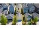 Aerial view showcasing this home nestled amongst neighboring houses and lush green lawns at 777 Fireball Ct, Knightdale, NC 27545