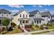 Beautiful two-story home with manicured lawn and a charming front porch at 777 Fireball Ct, Knightdale, NC 27545