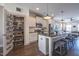 Well-equipped kitchen with white cabinets, stainless steel appliances, and a walk-in pantry at 777 Fireball Ct, Knightdale, NC 27545