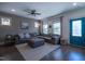 Cozy living room with stylish furniture and a view of the front door at 777 Fireball Ct, Knightdale, NC 27545