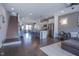 Spacious open-concept living area with hardwood floors and modern decor at 777 Fireball Ct, Knightdale, NC 27545