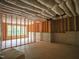 Unfinished basement space with framing and insulation, ready to be customized at 7805 Ailesbury Rd, Wake Forest, NC 27587