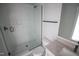 Elegant bathroom features a tiled shower with glass door and modern fixtures at 7805 Ailesbury Rd, Wake Forest, NC 27587