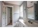 Elegant bathroom featuring marble countertop vanity, gray walls, modern fixtures, and tiled floors at 7805 Ailesbury Rd, Wake Forest, NC 27587
