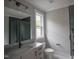 Modern bathroom featuring a vanity with marble countertop and glass enclosed shower at 7805 Ailesbury Rd, Wake Forest, NC 27587