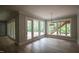 Bonus room area features large windows and access to the outside and stairs at 7805 Ailesbury Rd, Wake Forest, NC 27587