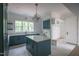 Well-lit mudroom area with island, built-in storage, and ample counter space at 7805 Ailesbury Rd, Wake Forest, NC 27587