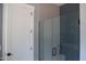 Contemporary bathroom showcasing a glass-enclosed shower with stylish tile and a built-in bench at 7805 Ailesbury Rd, Wake Forest, NC 27587