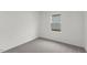 Cozy carpeted bedroom featuring a window for natural light at 805 Kenyon Spring Dr, Zebulon, NC 27597