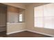 Living Room with hardwood flooring, natural light, and a view of the stairway to the second floor at 8511 Bright Loop, Raleigh, NC 27613