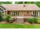 The house has a wooden deck with stairs leading down to the lawn at 101 Easton Ct, Garner, NC 27529