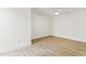 Bright and airy bedroom has wood-look laminate floors and a ceiling fan at 101 Easton Ct, Garner, NC 27529