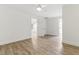 Bedroom view featuring wood-look laminate floors, white walls, and ceiling fan at 101 Easton Ct, Garner, NC 27529