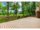 Expansive wooden deck with railings and steps, perfect for outdoor entertaining at 101 Easton Ct, Garner, NC 27529