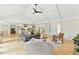 Inviting living area with vaulted ceilings, hardwood floors, and neutral decor, creating a comfortable and stylish space at 101 Easton Ct, Garner, NC 27529