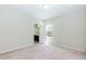 Bedroom with neutral walls and carpet with ensuite bathroom entrance at 1013 Oatney Ridge Ln, Morrisville, NC 27560