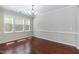 Dining area with hardwood floors and plenty of natural light at 1013 Oatney Ridge Ln, Morrisville, NC 27560