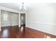 Dining room with hardwood floors and natural light at 1013 Oatney Ridge Ln, Morrisville, NC 27560