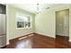 Bright dining area featuring hardwood floors, recessed lighting, and a window at 1013 Oatney Ridge Ln, Morrisville, NC 27560