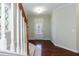 Bright entryway featuring hardwood floors and natural light at 1013 Oatney Ridge Ln, Morrisville, NC 27560