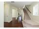 Spacious foyer with hardwood floors and staircase at 1013 Oatney Ridge Ln, Morrisville, NC 27560
