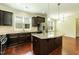 Modern kitchen with stainless steel appliances and granite countertops at 1013 Oatney Ridge Ln, Morrisville, NC 27560