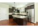 Well-equipped kitchen with a large island and stainless steel appliances at 1013 Oatney Ridge Ln, Morrisville, NC 27560