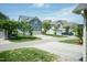 Street view of a charming residential neighborhood with well-maintained lawns and sidewalks at 1013 Oatney Ridge Ln, Morrisville, NC 27560