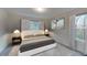 Relaxing primary bedroom featuring neutral tones, natural light, and carpeted flooring at 106 S Chubb Rdg, Wilson's Mills, NC 27520