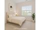 Bright bedroom features neutral walls, a plush carpet and a large window to let in natural light at 1073 Branch Line Ln, Apex, NC 27502