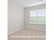 A blank bedroom with a window, neutral paint and carpet in a new home at 1073 Branch Line Ln, Apex, NC 27502