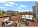 Relaxing deck features comfortable outdoor seating and a stunning view at 1073 Branch Line Ln, Apex, NC 27502