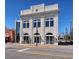 Impressive commercial building featuring architectural details and large arched windows at 1073 Branch Line Ln, Apex, NC 27502