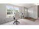 Well-lit home office with two windows providing natural light, perfect for remote work or study at 1073 Branch Line Ln, Apex, NC 27502
