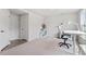 Versatile home office features neutral colors, ample space, and easy access to storage and closet at 1073 Branch Line Ln, Apex, NC 27502