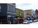 Charming downtown streetscape with colorful buildings, storefronts, and bustling pedestrian activity at 1073 Branch Line Ln, Apex, NC 27502