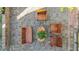 Aerial view of a brick patio with wooden furniture and charming outdoor space at 1112 Western Ave, Rocky Mount, NC 27804