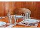 Cozy dining table set with mason jar glasses and vintage plates at 1112 Western Ave, Rocky Mount, NC 27804