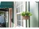 Exterior window view of the home with a flower pot at 1112 Western Ave, Rocky Mount, NC 27804