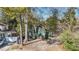 Charming two-story home with a well-maintained lawn and mature trees providing shade at 1112 Western Ave, Rocky Mount, NC 27804